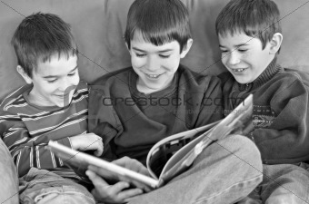 Three Boys Reading