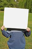 Child Holding a Blank Sign
