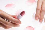 finger lipstick and rose