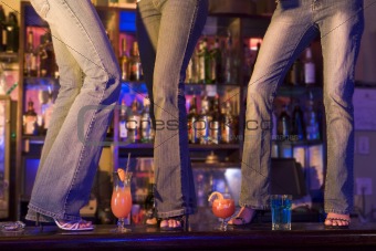 3 Women Dancing On Bar
