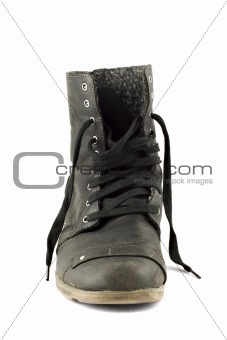 Used leather boot isolated on white background