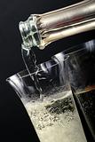 Champagne poured in to the glass