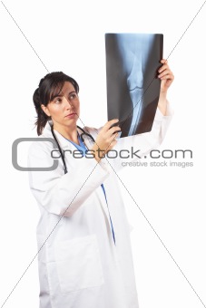 Female doctor examining x-ray 