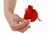 female hand holding red gift