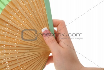 female hand with decorated fan