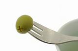 olive stuck on a fork