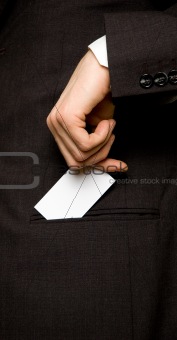 Businesscard in the pocket of a suit