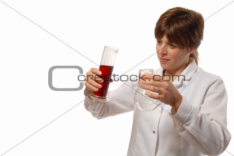 young lady scientist pours liquid