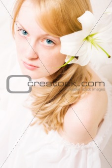 young woman with white lily