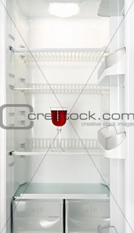 Red wine glass in a refrigerator