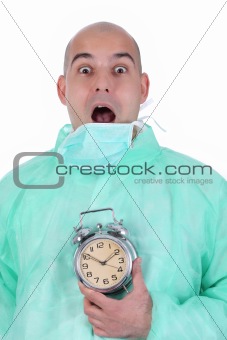 surgeon and clock alarm