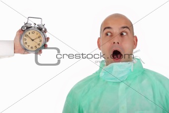 surgeon and clock alarm