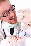 doctor taking hand full of tablets 