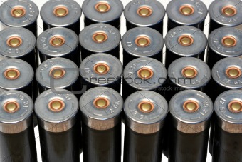 12 gage black shotgun shells background