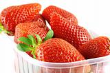 close up of a container full of fresh strawberry