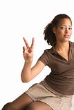 African girl gives a peace sign