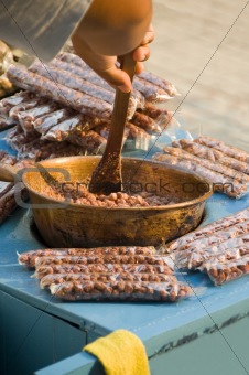 Street Trader Preparing Nuts for Sale