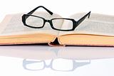 book and eyeglasses 