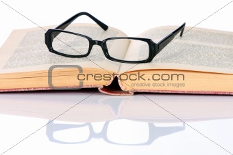 book and eyeglasses 