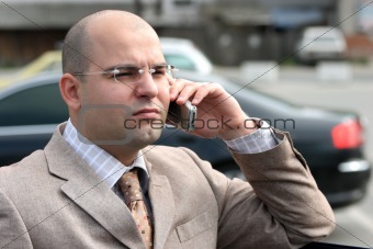A businessman calling by mobile phone