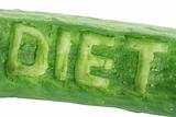 word DIET scraped out in a cucumber