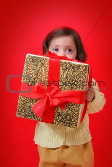 Toddler with a christmas gift