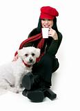 Woman relaxing with a small pet dog