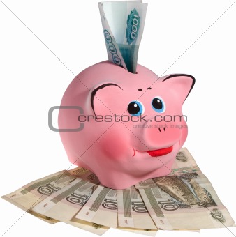 Pink piggi-bank with banknotes. Isolated