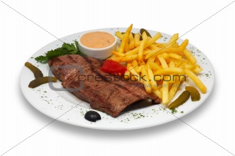 grilled beef steak with french fries and sauce served in plate. isolated.