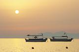 Boat silhouette at sunrise 2