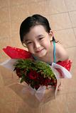 girl holding bouquet of roses