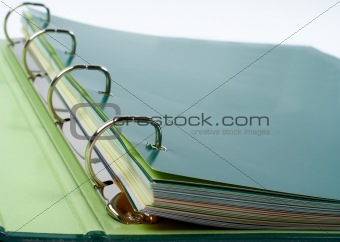 Binder closeup with files stacked