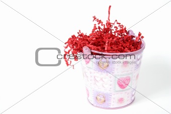 Bucket with Red Paper hanging out