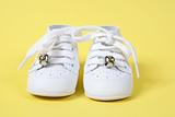 Baby Shoes on Yellow background