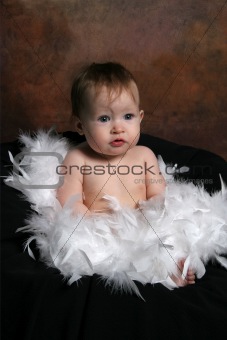 Baby wrapped in Feathers