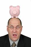 Business Man with Piggy Bank on head and his mouth open