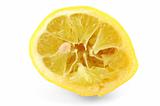 squeezed out lemon on white background