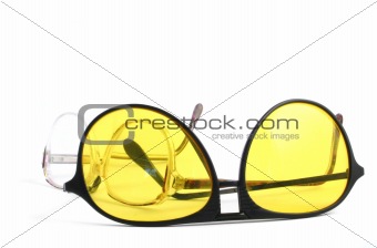 two pairs of glasses on white