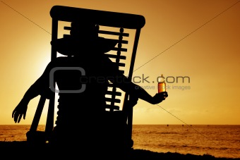 Beer and Deckchair sunset silhouette