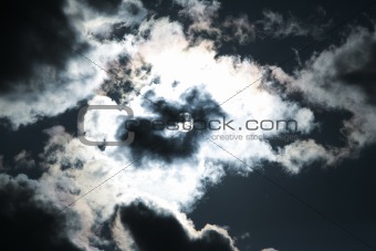 Moon and clouds on the dark sky