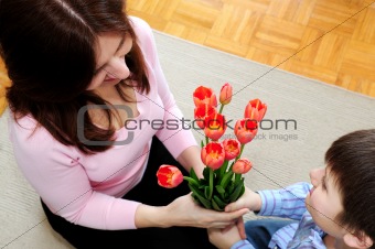 Mother and son with flowers