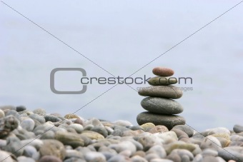 round stones for meditation on blurred background