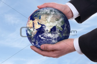 earth in a hands, blue