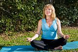 Mature Woman Yoga with Copyspace