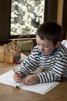 1st grade boy doing homework