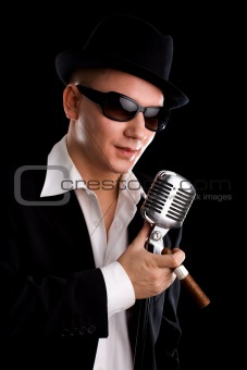 Singer with old fashioned mic