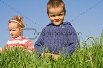 Kids playing in the grass
