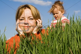 Woman and little girl outdoors