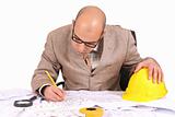 Businessman with architectural plans 