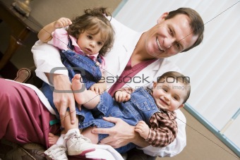 Consultant holding IVF children